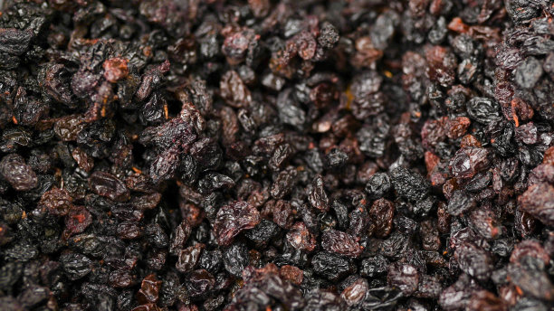 葡萄干作为背景葡萄葡萄干纹理。葡萄干在超市图片下载