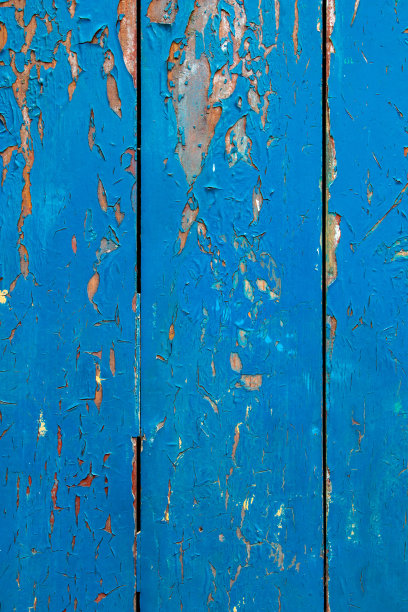 木纹特写照片。复古木墙背景。蓝色开裂的油漆板图片下载