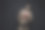 英俊的男子站在黑色背景前图片下载
