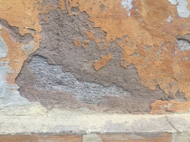 涂着橙黄色油漆的混凝土墙图片下载