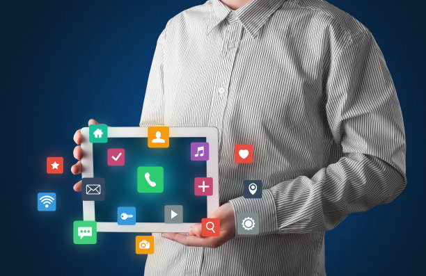 商人持有平板电脑与多媒体的概念图片下载