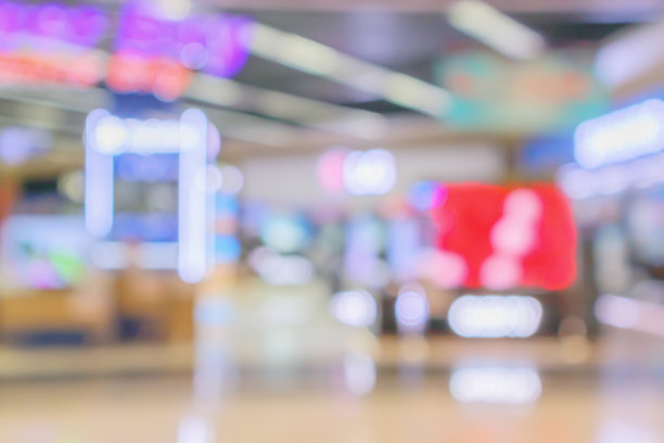 电子百货公司展示电视电视和家用电器与散景光模糊的背景图片下载