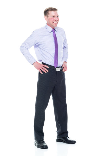 英俊的商人穿着漂亮的衣服-手放在臀部图片下载