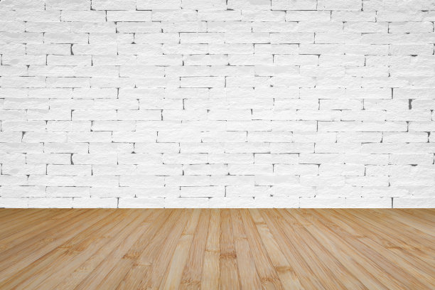 白色的砖墙，自然的黄褐色背景木地板图片下载