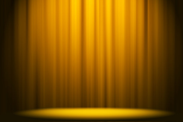 舞台上的黄色幕布是演播室的娱乐背景。图片下载