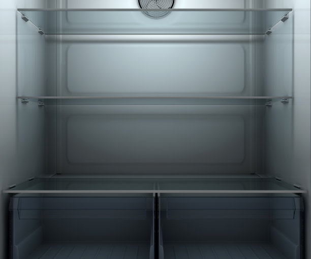 昏暗的空冰箱内部图片下载