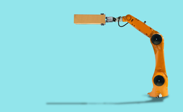 机器人手臂握住盒子工业机械技术在一个白色的背景。图片下载
