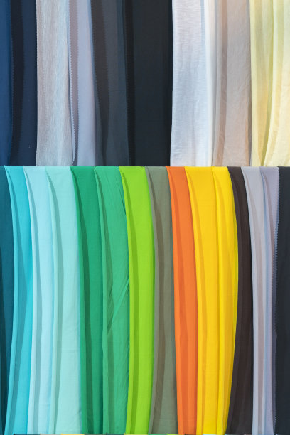 彩色布料背景纹理的图片样本。皱巴巴的织物。verticak照片图片下载