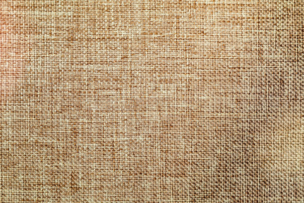 织物覆盖。米色织物纹理。粗糙的织物质地，图案。图片下载