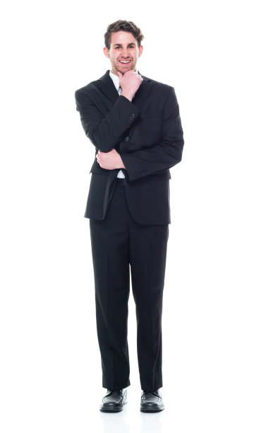 年轻英俊的商人穿着西装打着领带——正在思考图片下载