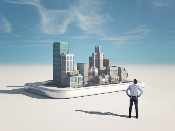 男人在智能手机上看3d城市。图片下载