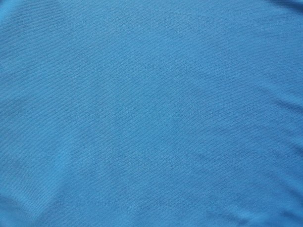 蓝色的织物。图片下载