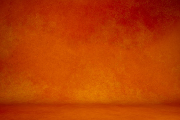 照片背景为桔红色。有纹路的墙面在地板上滚动。工作室摄影背景由定向光照明。传统的油画帆布或薄纱织物布工作室的背景图片下载