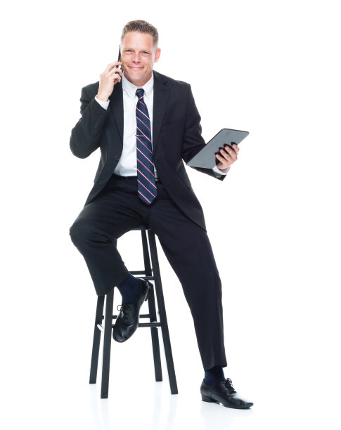 商人正在用平板电脑打电话图片下载