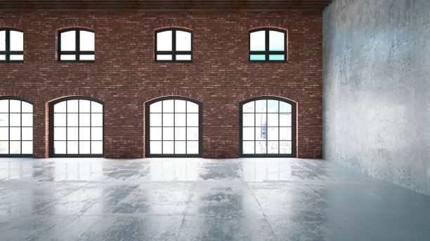 带窗户的空砖墙。机库图片下载