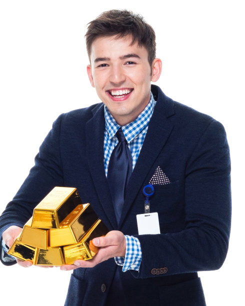 有魅力的商人是持有黄金的图片下载