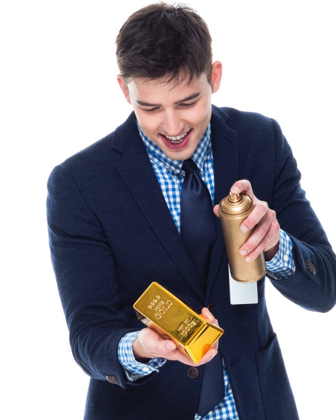 有魅力的商人是持有黄金的图片下载