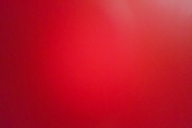 背景红色皮革拍摄模糊和粒状的移动相机。图片下载