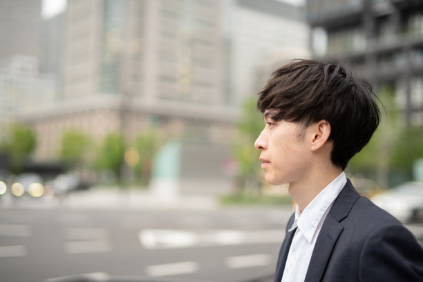 年轻商人的脸部特写图片下载