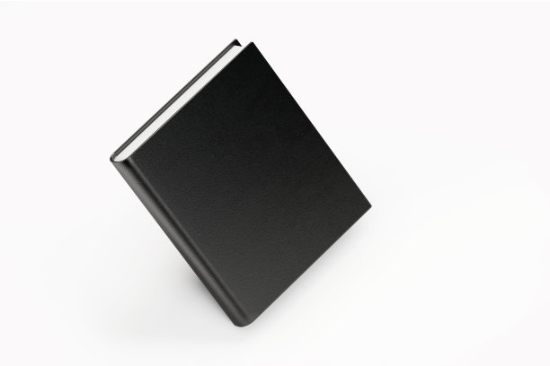 黑色皮革书在白色的背景图片下载