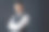 帅气自信的男人在优雅的西装与交叉的双臂在黑色的背景图片下载