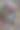 图片自制的巧克力披萨与五彩糖果糖果和糖霜糖，烤披萨皮充满榛子巧克力涂抹儿童，顶部是脆糖涂彩虹smarties巧克力糖果，吃布丁甜点图片下载