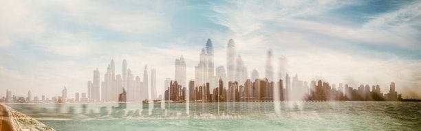 从空中俯瞰迪拜码头天际线和朱美拉棕榈岛，阿联酋图片下载