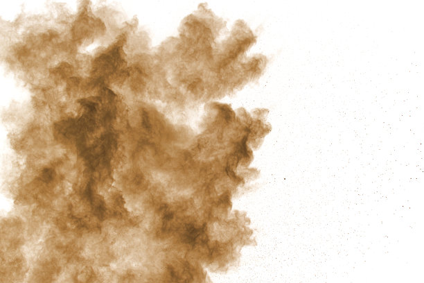 棕色的尘云。棕色的粒子飞溅在白色的背景上。图片下载