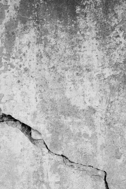 又旧又脏的水泥墙，有很深的裂缝，破损。Hintergund,纹理。图片下载