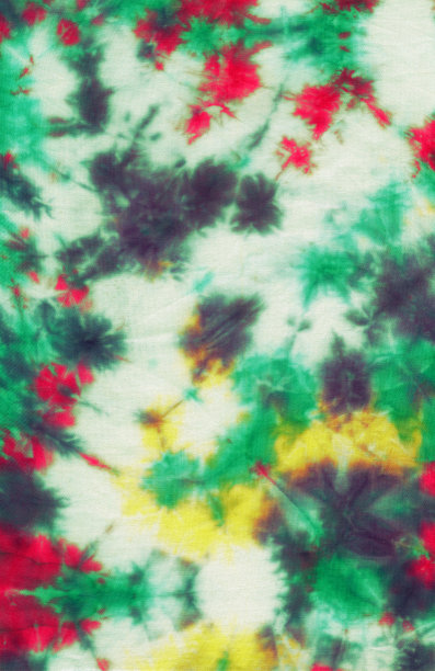 抽象的手绘织物黄、红、绿的背景和不规则的斑点图片下载