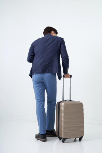 后视图的商人与行李图片下载