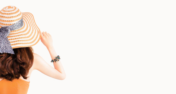 美丽漂亮的女人戴着草帽和性感的套装孤立在复古的背景。图片下载