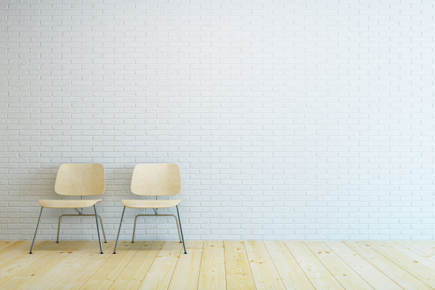 房间有两把现代的椅子和白色砖墙图片下载