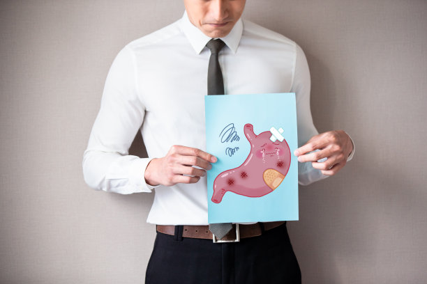 胃不舒服的商人图片下载