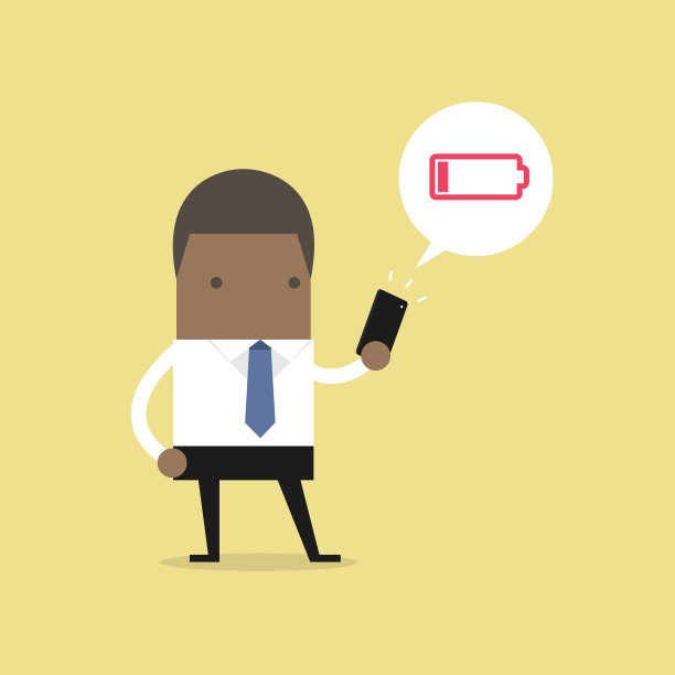 非洲商人使用低电量警报的智能手机。图片下载