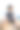 蹒跚学步的小女孩穿着泳衣坐在沙滩上哭泣图片下载