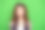 近距离的照片漂亮的女士送飞吻吸引男孩男子男朋友华丽优雅的化妆女孩的女性的穿着格子现代装孤立在绿色的背景图片下载