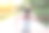 亚洲少女戴着一顶帽子站着拍照图片下载