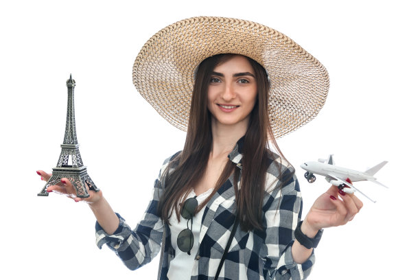 戴着帽子的女人捧着埃菲尔铁塔和飞机孤立在白色图片下载