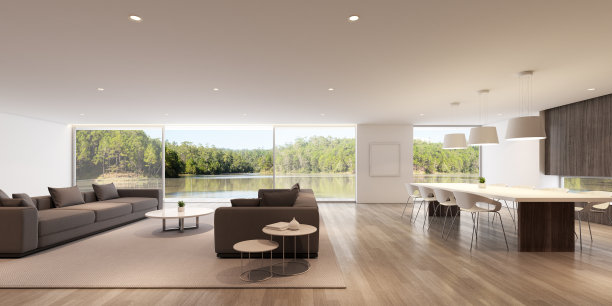以湖景为背景的灰色沙发和餐桌为视角的现代豪华客厅，家庭度假的理念——暖色调的木材室内设计——3D渲染。图片下载