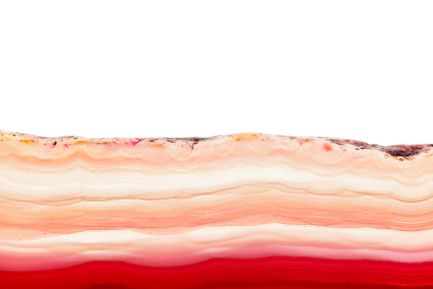 摘要背景，红橙红色玛瑙片条纹状矿物孤立上白色图片下载