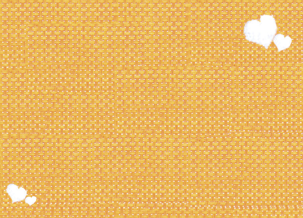 橙色背景上的心形图案图片下载