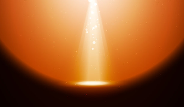 橙色的灯光。模糊射线与聚光灯魔术的背景和圆形辉光。图片下载