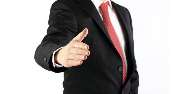 商人主动握手图片下载