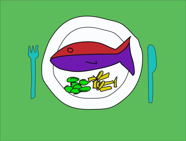 一整条鱼和蔬菜和薯条放在盘子里图片下载