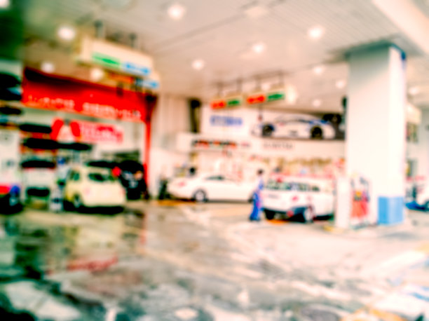 加油站和洗车场的模糊背景图片下载