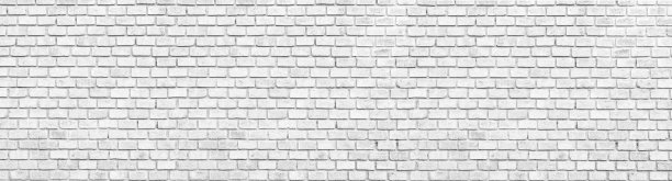 全景黑白结构砖墙。全景固体表面。石头的背景。图片下载