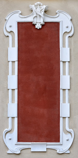 空的石膏框架灰泥在建筑的外立面上以复古的风格图片下载