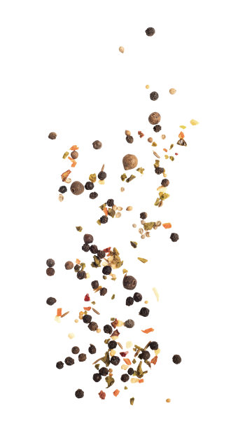 飘落的胡椒豌豆孤立在白色的背景上图片下载