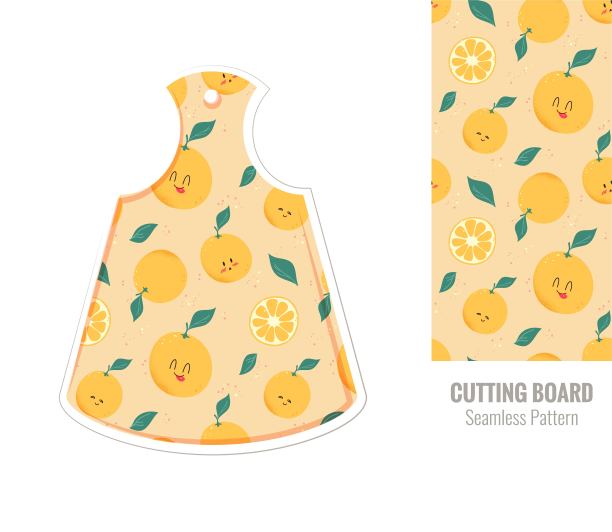 可爱橙色图案的厨房砧板。图片下载